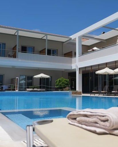 Outdoor swimming pool at Iris Premium in Nydri