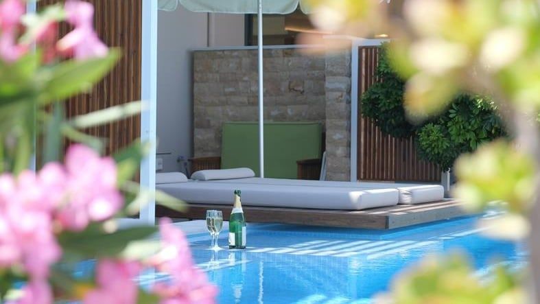 Iris Hotel pool and terrace overlooking the hills of Nydri